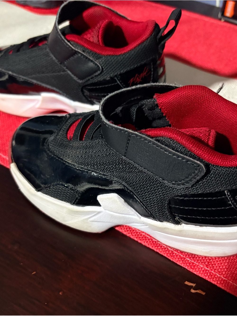 Jordan Kids Black and Red Low-Top Sneakers with Hook Strap